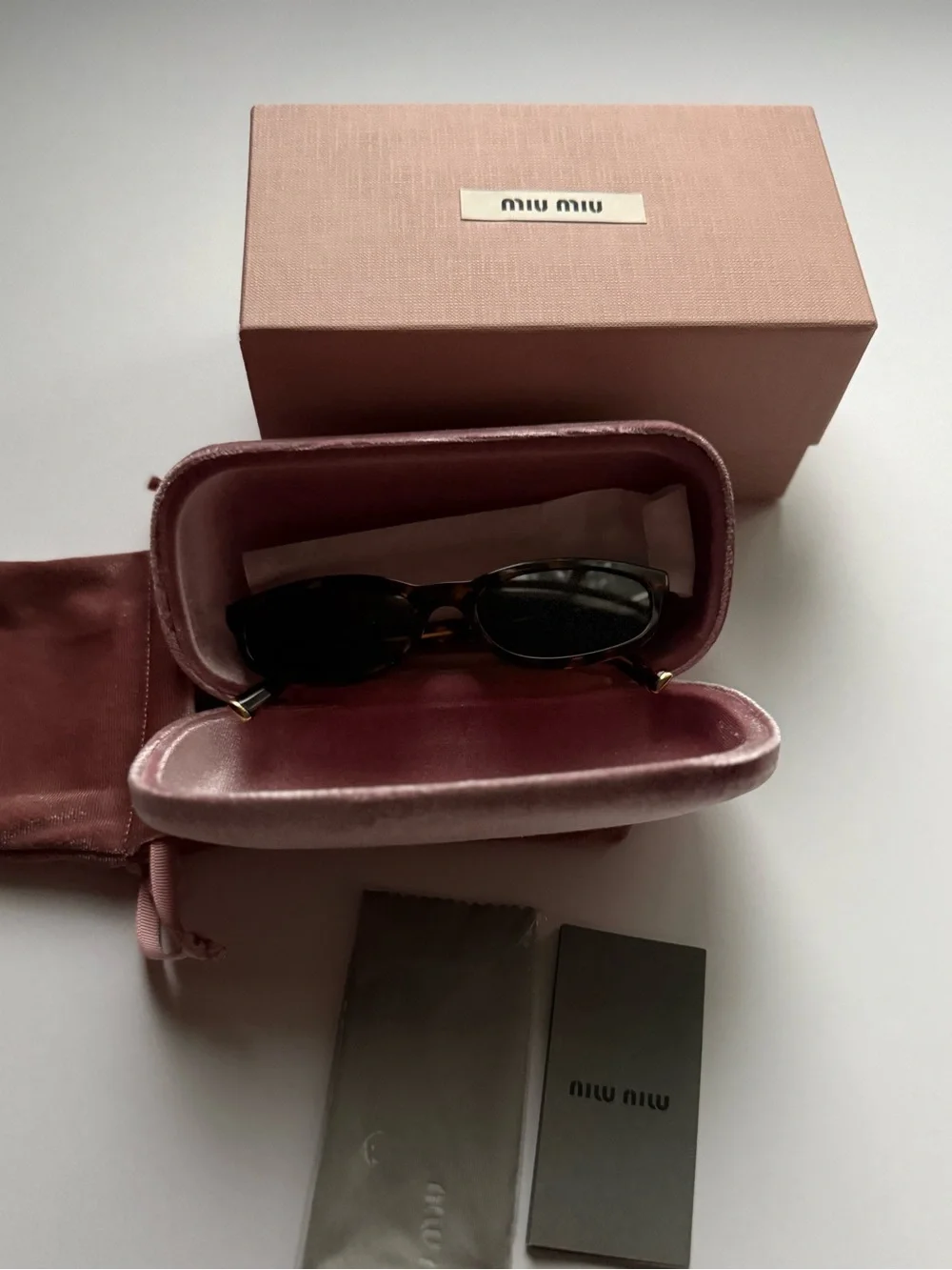 Miu Miu Regard Tortoiseshell Women’s Sunglasses